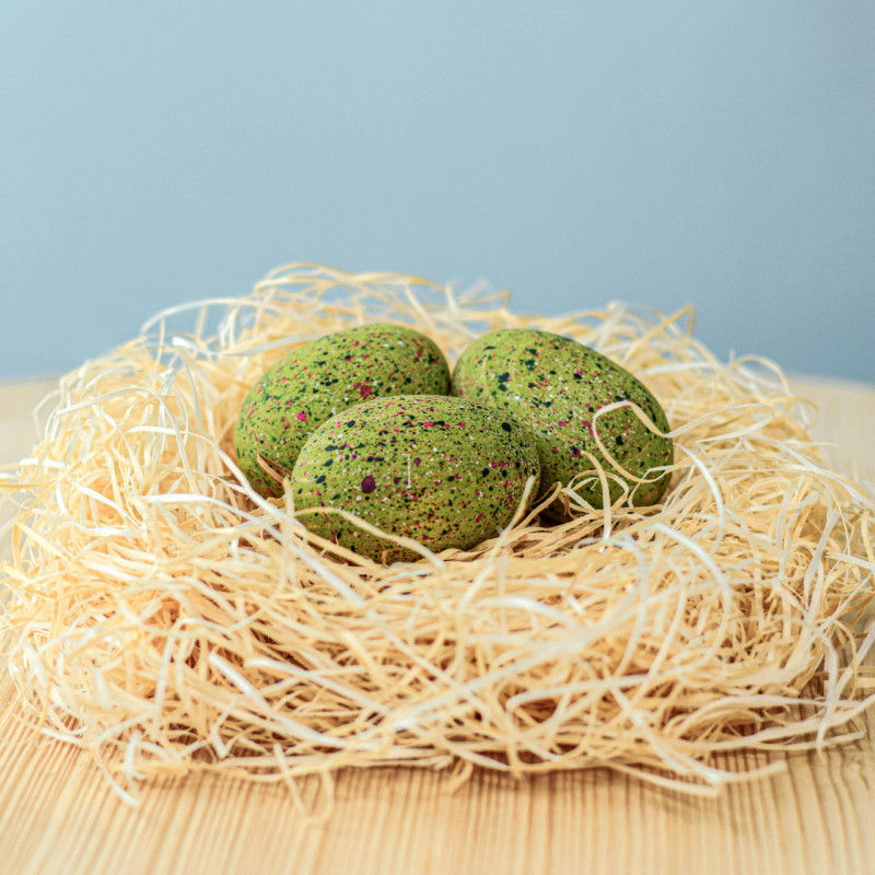 Thumbnail: Bumbu Toys Wooden T-Rex Dinosaur Egg Set on a wooden surface