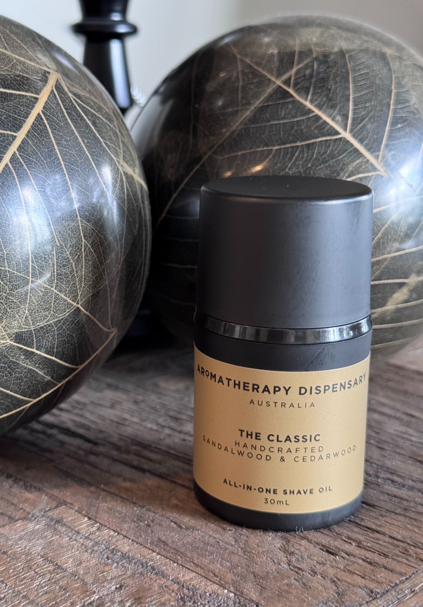 Elegant glass bottle of The Classic All-in-One Shave Oil