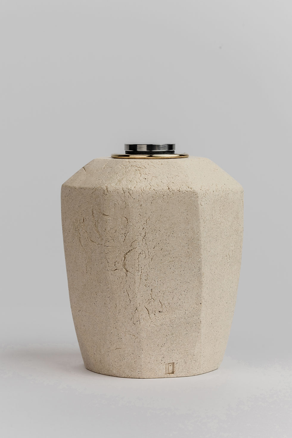 Thumbnail: Large geometrical ceramic pet urn with traditional form and stone-like finish photographed on a clean white studio background