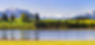Idyllischer See mit Alpenpanorama