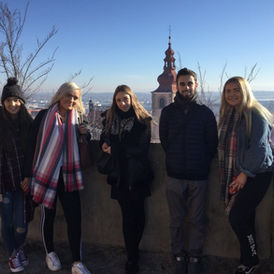 Five friends sightseeing, scenic city view
