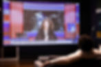 bored-man-watching-anchorwoman-present-breaking