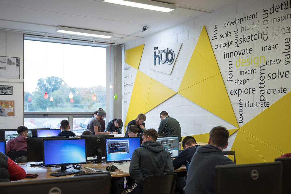 Students collaborating on design projects in the Hub at Cavan Institute.