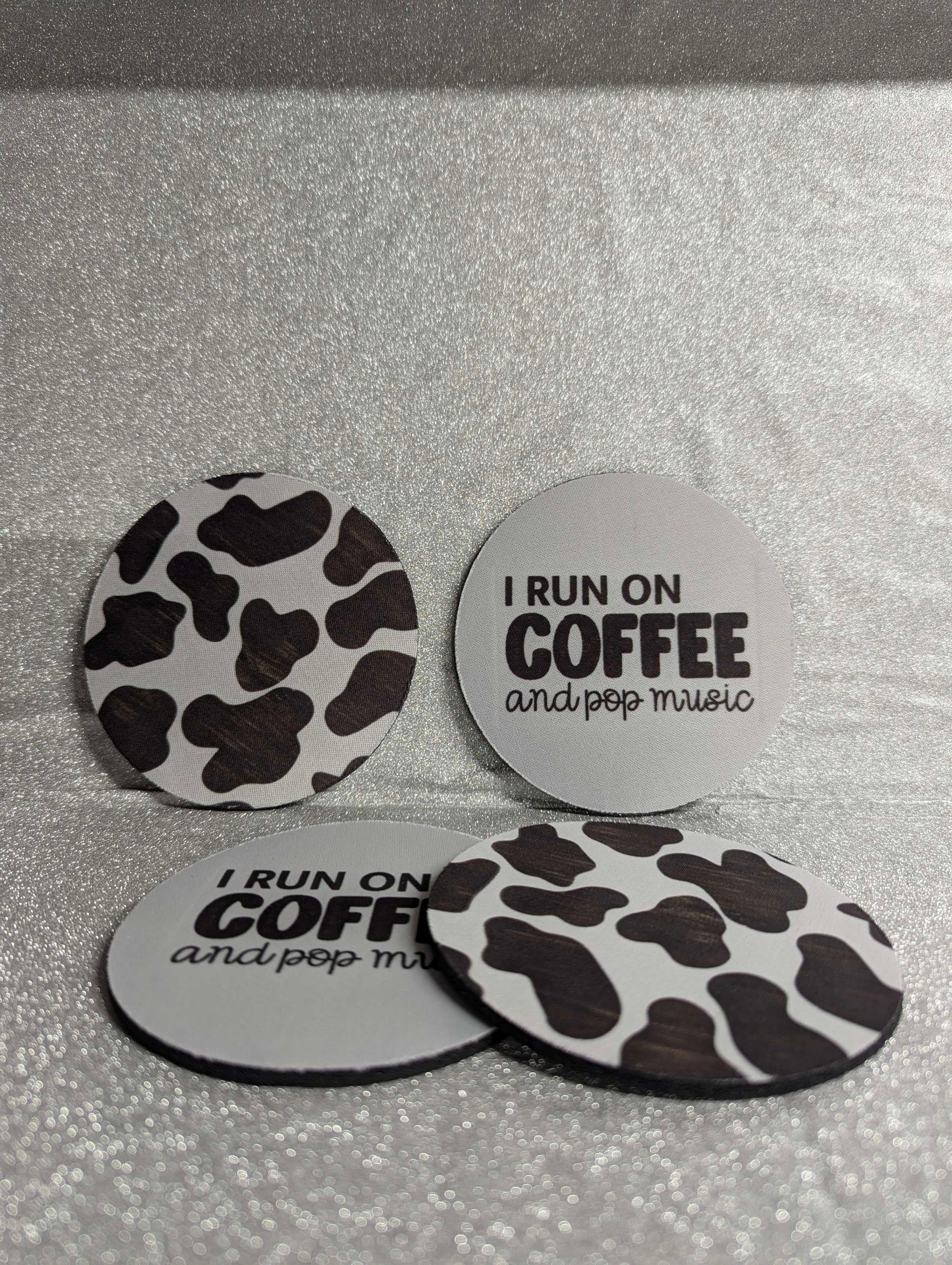 Cow Print & I Run on Coffee and Pop Music Cup Coasters. Protect your surfaces with these cute coasters.
