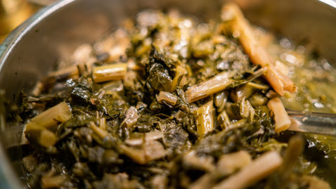 Southern food for catering services in Greensboro, NC with fresh sides like collard greens.
