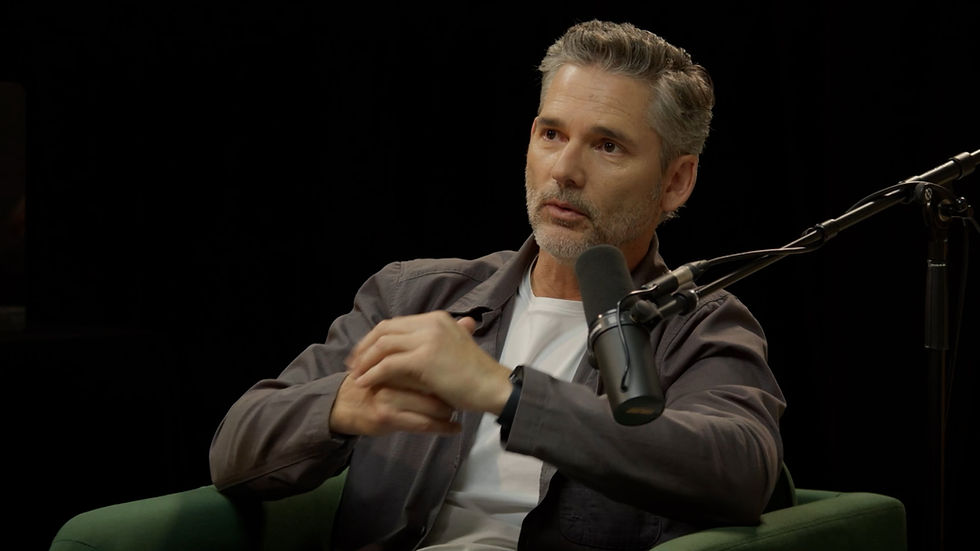 Man speaking into a microphone for corporate video.