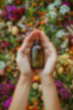 bottles-with-tincture-medicinal-herbs-hands-woman-selective-focus.jpg