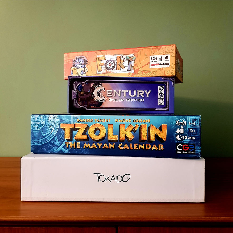 a pile of board games Fort, Century Golem Edition, Tzolk'in and Tokaido