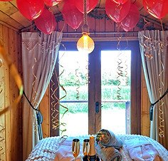 Balloons on the roof at a shepherd hut at little oakhurst
