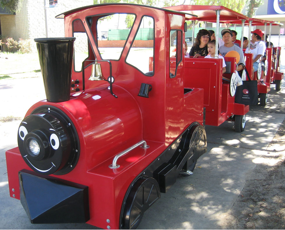 Red trackless train party rental