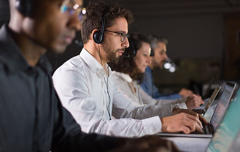 confident-call-center-operator-talking-with-client.jpg