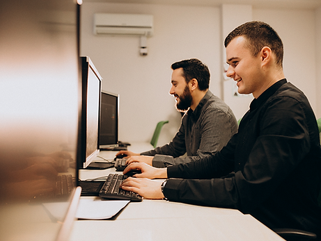 young-male-web-designers-working-computer 3.png