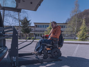 Person accessing vehicle on their mobility scooter