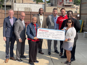 Walgreens staff members win first place in their Red Nose Day Campaign, yielding a $15,000 donation