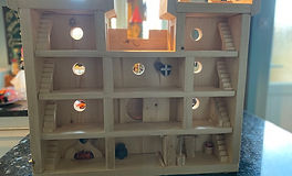 A Handmade Wooden Cross Section Tower - Rear Elevation