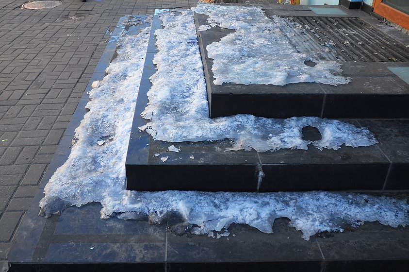 For ice hazard prevention, de-icing occurs when any combination of near-freezing air/ground temperatures with wet ground, high humidity, precipitation, ice, snow or sleet exist or have a reasonable probability of occurring within 24 hours. We stockpile 250 tons of salt and reserve large quantities of salt to protect us in the event of a shortage. All company plow trucks are equipped with large salt spreaders that allow us to de-ice immediately after plowing (most companies separate those duties, delaying the de-icing process). Crews take multiple before/after photos that instantly upload to dispatch’s virtual dashboard for quality control. Additionally, supervisors perform site inspections to ensure the site is safe for opening..jpeg
