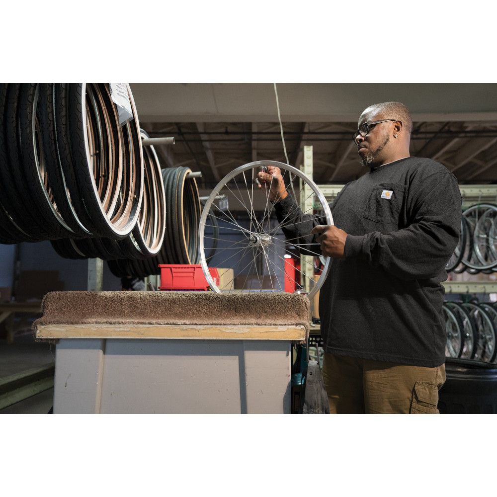 Lifestyle of model in Carhartt Workwear Long-Sleeve Tee with Pocket