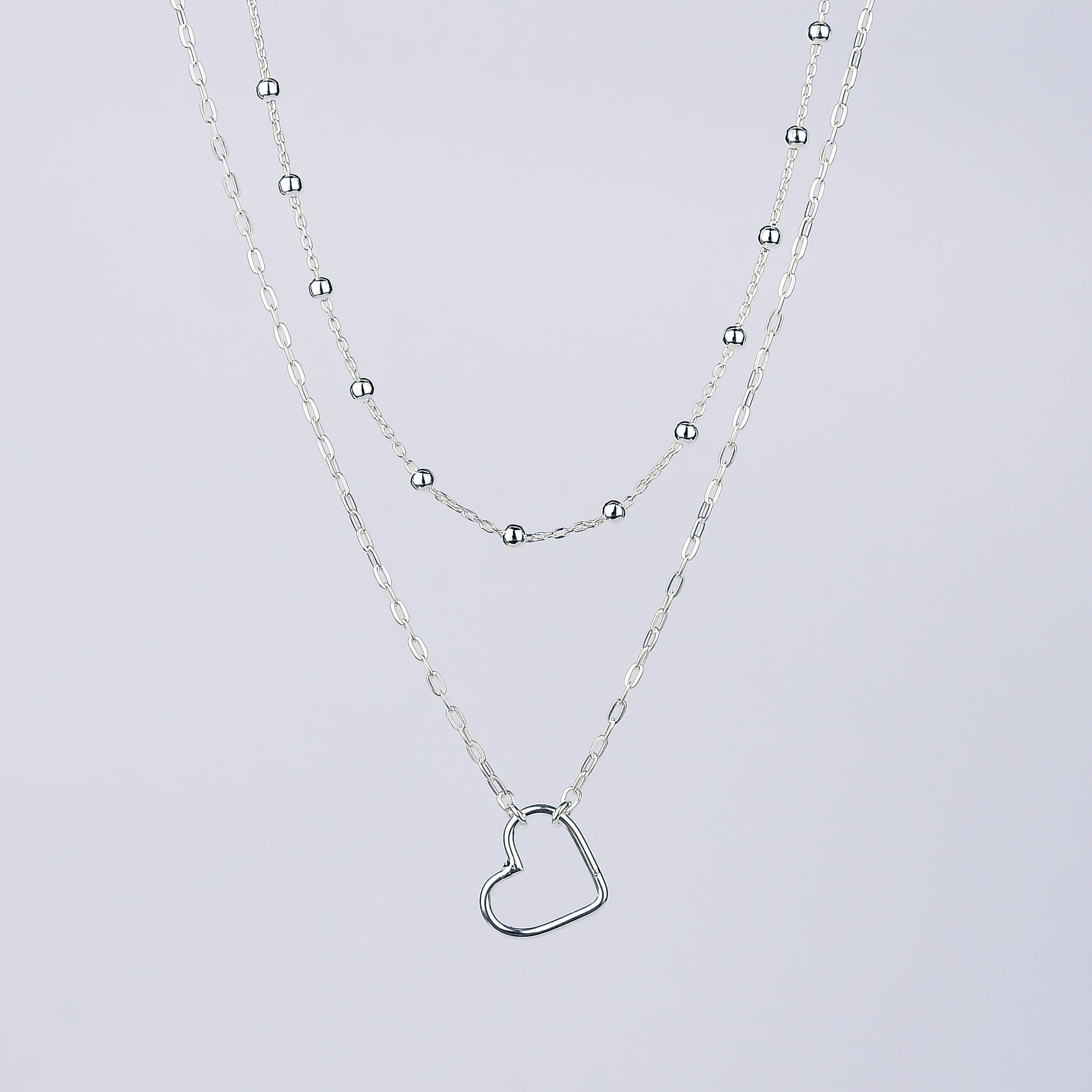 Colar duplo coração e bolinha