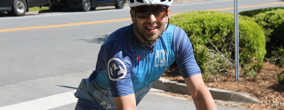 Chris smiles at Nora after he finishes the Rose City Rampage Race.