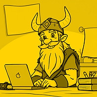 viking sitting at a desk looking happy.jpg
