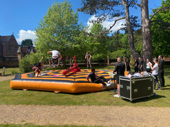Advantage Events | Outdoor Team Building | Totally Wiped Out | Competitive Inflatable Fun