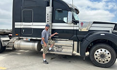 Josh Sullivan with truck for website.jpg