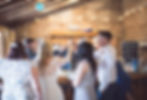 Wedding guests in the bar at Stockbridge Farm Barn