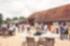 Wedding guests celebrating outside Stockbridge Farm Barn