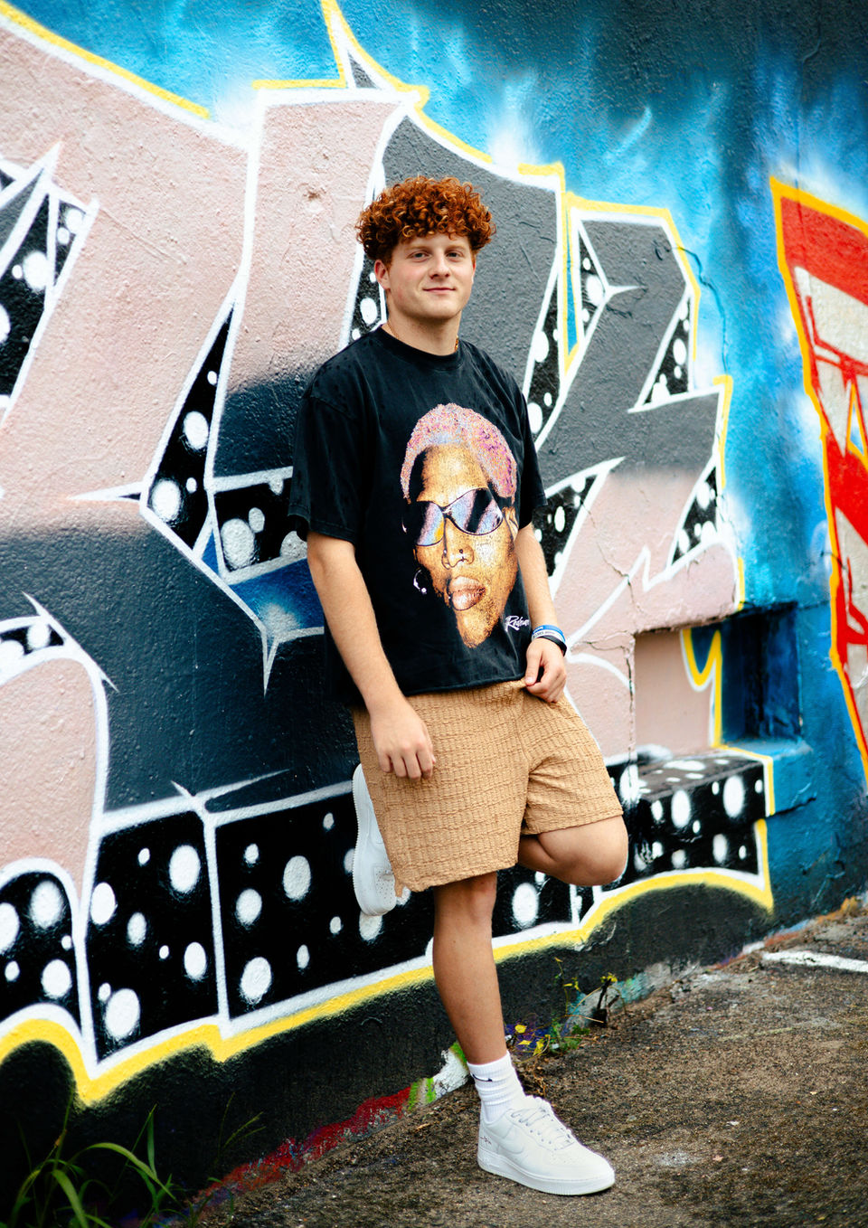 Modern Urban Indianapolis Indiana Male Senior Photo Graffiti Wall