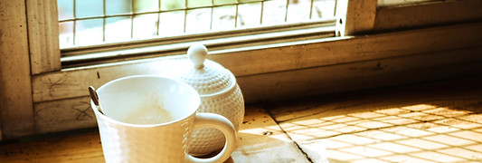 A cup of empty coffee on a wooden table