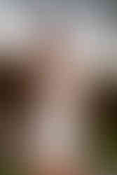 college senior with graduation stole