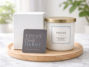 Autumn & After's Focus Candle with card and box, sat on wooden table