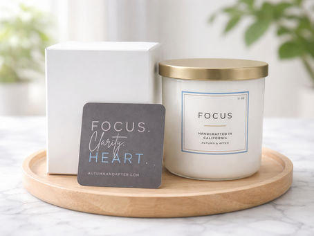 Autumn & After's Focus Candle with card and box, sat on wooden table
