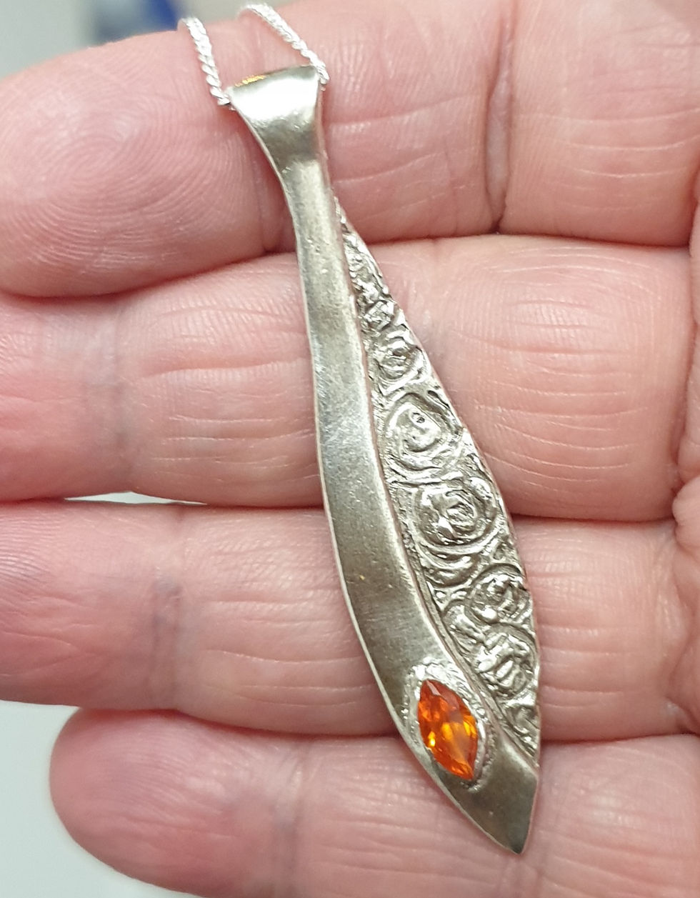 Thumbnail: Silver abstract fish shape with amber CZ