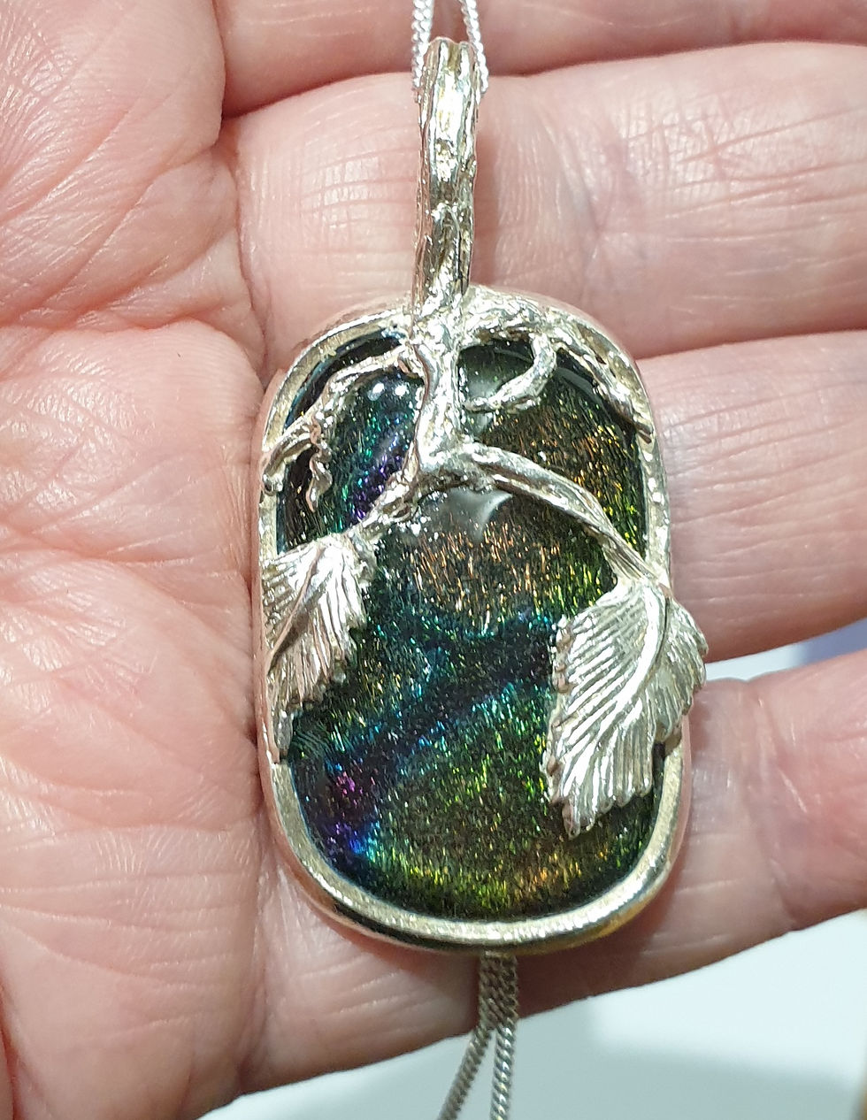 Thumbnail: Silver surround large multi cabochon with silver leaves