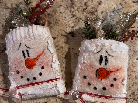 Snowman pocket ornaments made with recycled paper rolls!