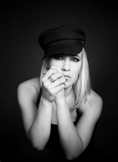 Black&white on studio portrait of goldsmith and luxury fine jewel designer Heidi Vornan from Finland.