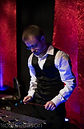 Jesse Baker performing on the bells in the band Mixtape at a gig