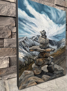 painting of an inukshuk in Kananaskis within the Canadian Rockies