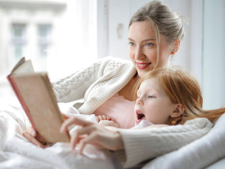mother reading to child showing love languages