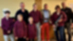Eine Gruppe Menschen mit Instrumenten