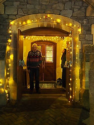 Illuminated doorway to the church