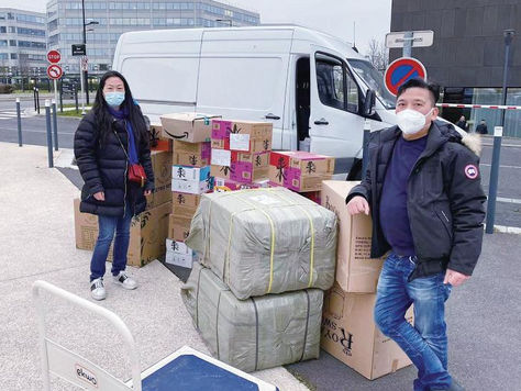 通过巴黎华助中心送物资 中使馆慰问滞留机场侨胞
