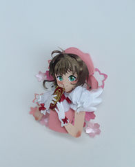 Figura de personagem Sakura Kinomoto com asas e vestido rosa