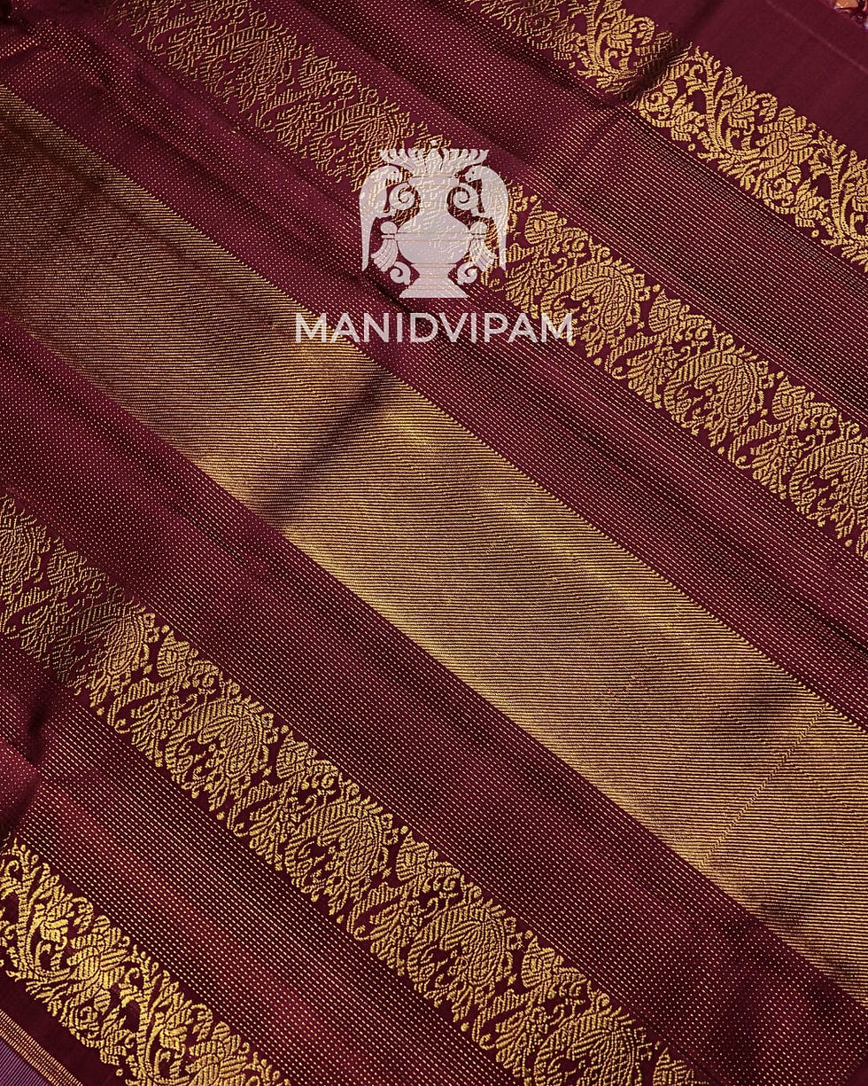 Thumbnail: Korvai Kanjivaram silk saree in a soft pastel peach and lavender checked body
