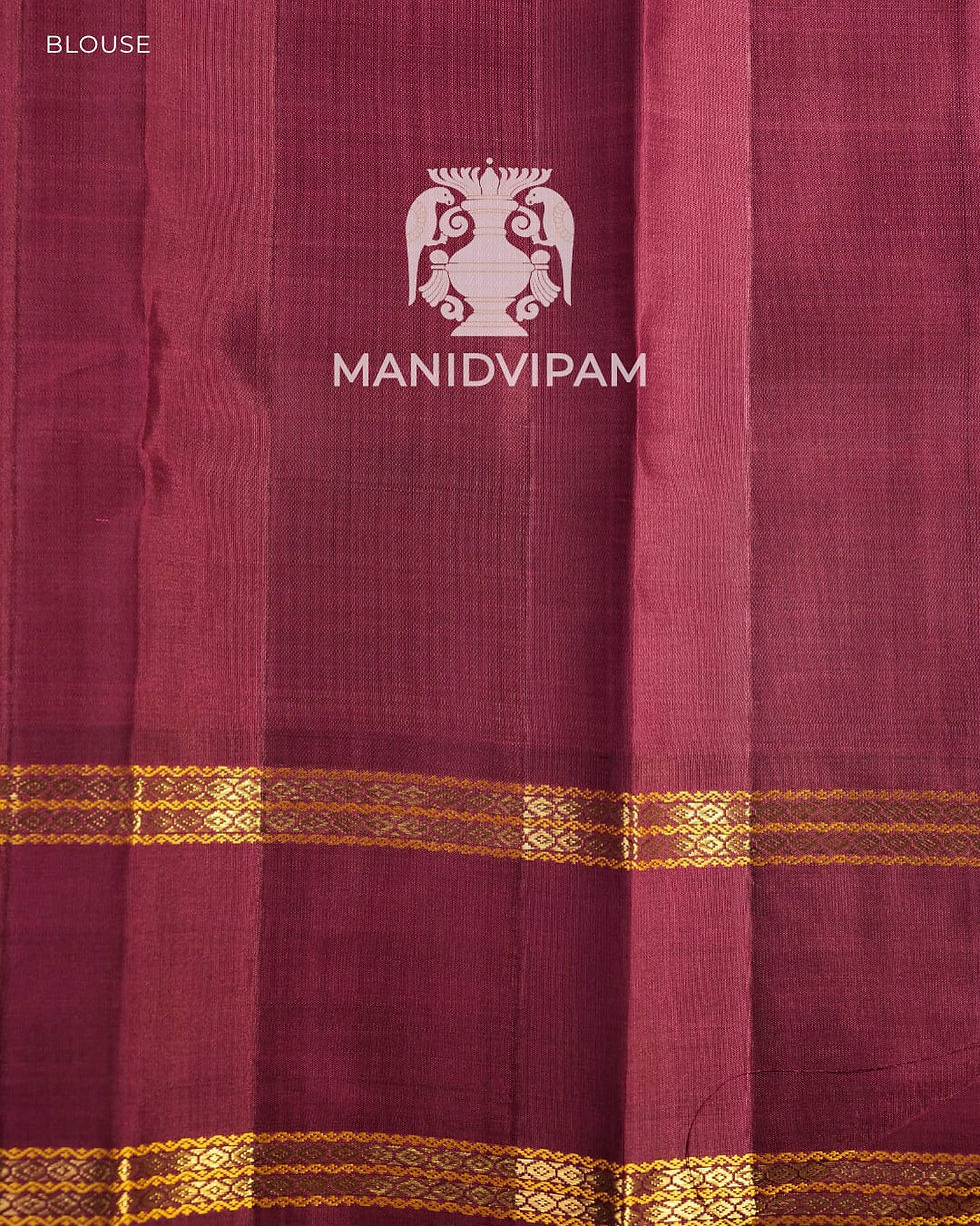 Thumbnail: Korvai Kanjivaram silk saree in a soft pastel peach and lavender checked body