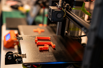 3D printer in a maker workshop by foundry.png