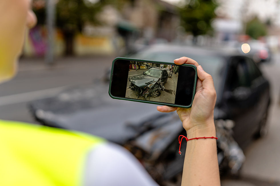 Accident-scene-viewed-thru-phone-iStock-1735196496.jpg