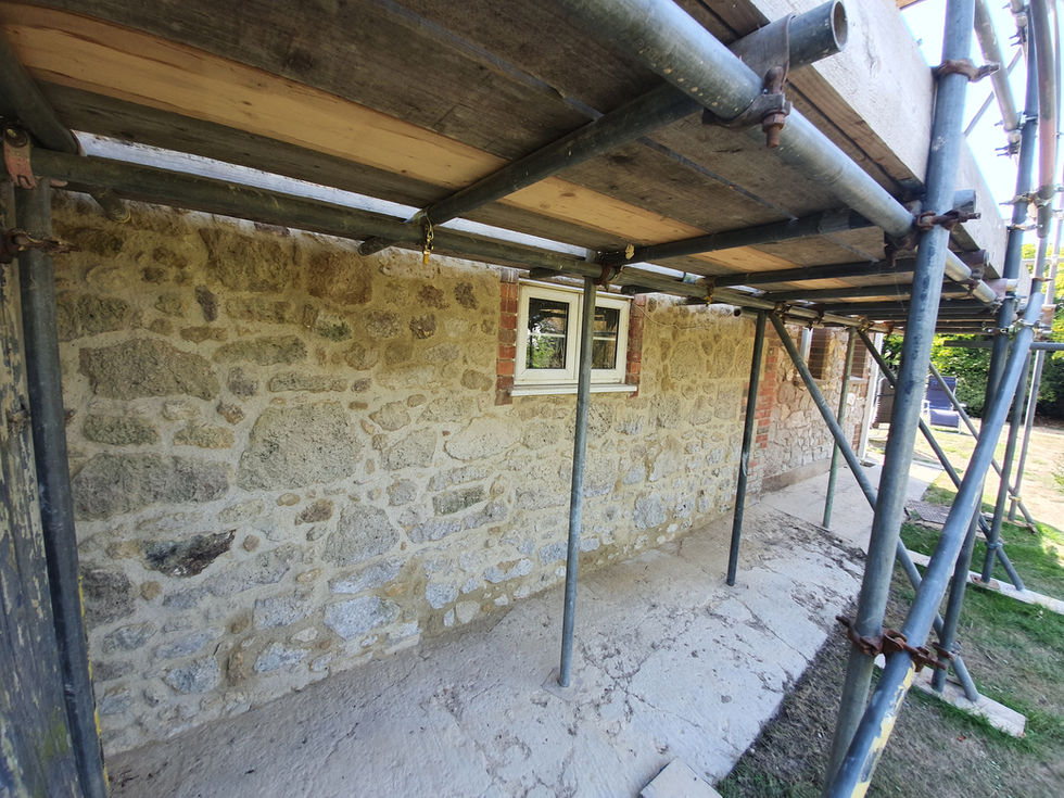 After - Cement based pointing removed and lime repointed.