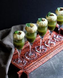 Pani Puri served in a glass.